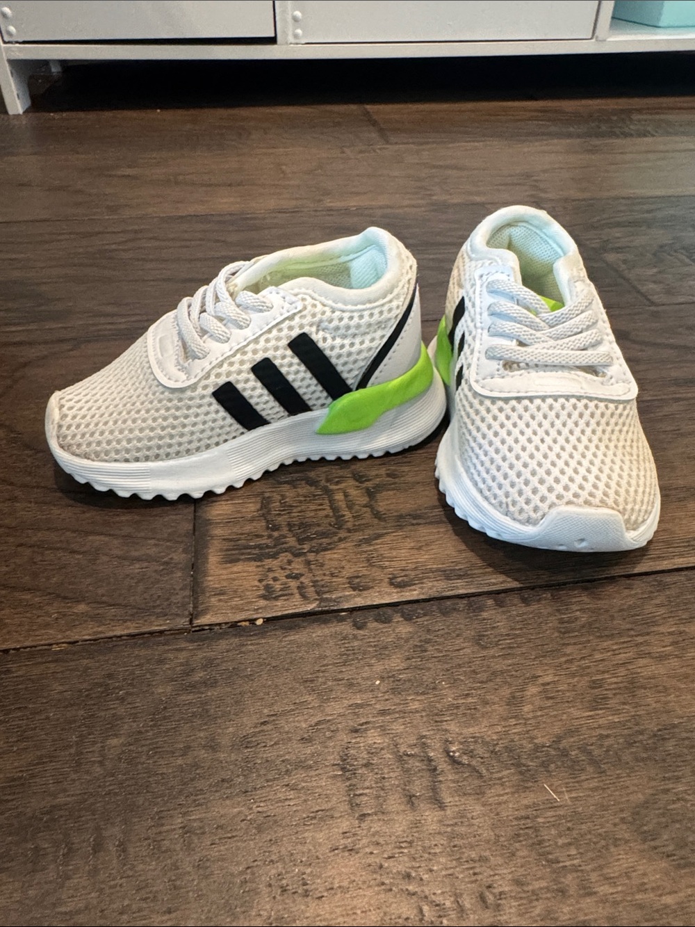 Kids White Mesh Athletic Sneakers with Black Stripes and Lime Accent